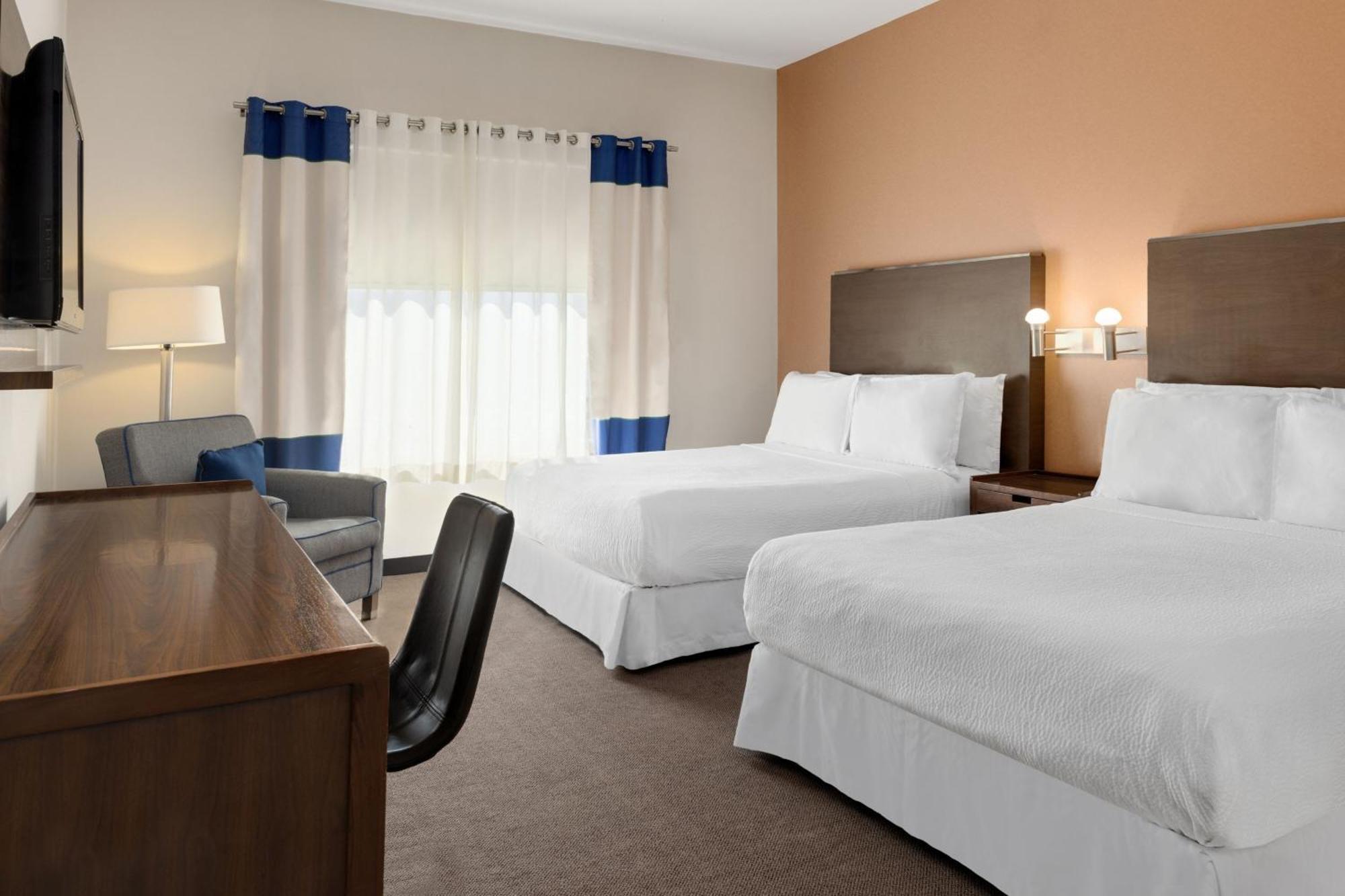 Four Points By Sheraton Galerias Monterrey Luaran gambar A typical guest room at an extended stay hotel